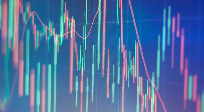 A financial chart of green and red vertical dash marks showing growth and losses
